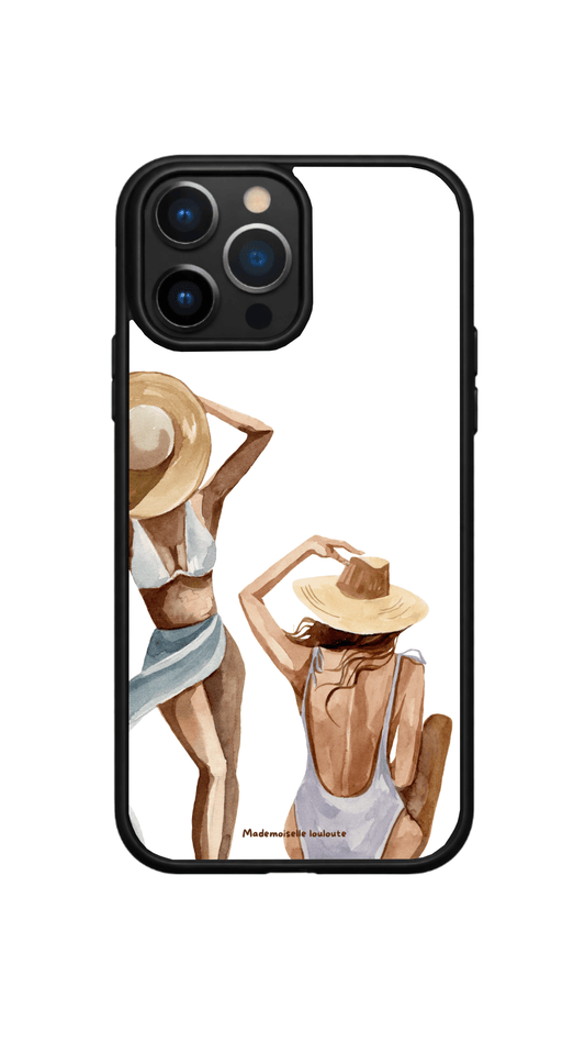Coque de téléphone Sunset Girls avec illustration aquarelle de deux femmes à la plage portant des chapeaux de paille, inspirée des vacances et de l'été.

